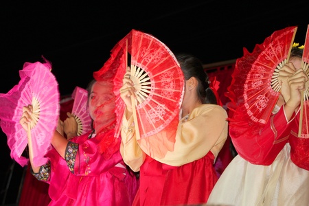 PAYAKKAPHUMPHISAI, MAHASARAKHAM, THAILAND - MARCH 11 : The unidentified children are performing modern dance in the end of semester Iam Suk school party on March 11, 2012 at city hall plaza, Payakkaphumphisai, Mahasarakham, Thailand.のeditorial素材