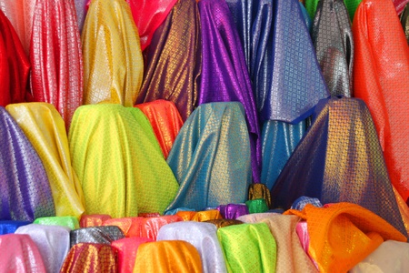 Colorful luxury and expensive clothes texture backgroundの写真素材