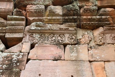 Sandstone carvings on wall in architecture of Prasat Khao Panom Rung, Buriram, Thailand.の写真素材