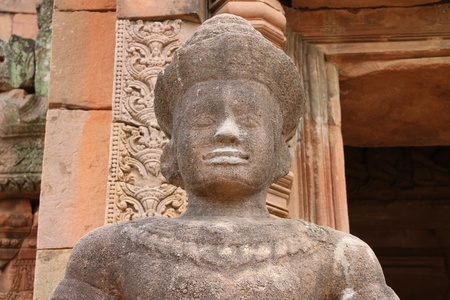 Guardian statue sandstone carvings by gateway of architecture of Prasat Khao Panom Rung, Buriram, Thailand の写真素材