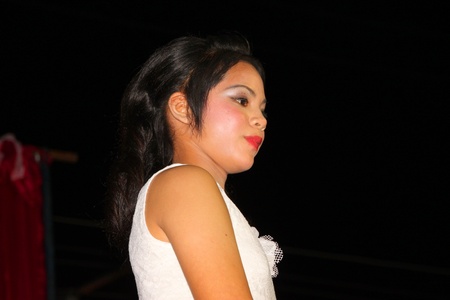 PAYAKKAPHUMPHISAI, MAHASARAKHAM - MARCH 11 : The unidentified girl is performing modern dance in school graduation party on March 11, 2012 at city hall plaza, Payakkaphumphisai, Mahasarakham, Thailand.のeditorial素材