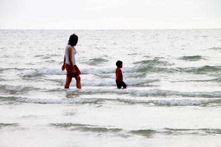 CHANTA BURI, THAILAND - APRIL 21 : Unidentified tourists are playing on the beach on April 21, 2012 at Chao Lhao Beach, Chanta Buri, Thailand.のeditorial素材