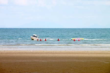 CHANTA BURI, THAILAND - APRIL 22 : Unidentified tourists are playing on banana boat on April 22, 2012 at Chao Lhao Beach, Chanta Buri, Thailand.のeditorial素材