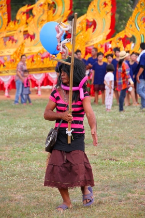 PAYAKKAPHUMPHISAI, MAHASARAKHAM - MAY 19 : Unidentified paraders are in traditional north-east Thai sky rocket ceremony and festival on May 19, 2012 at football playground, Payakkaphumphisai, Mahasarakham, Thailand.のeditorial素材