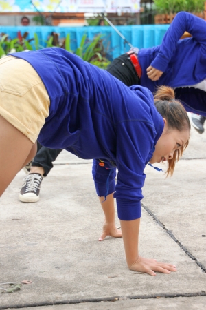 MUANG, MAHASARAKHAM - JUNE 24 : Unidentified dancers are performing in mini - half marathon contest and festival on June 24, 2012 at city plaza, Mahasarakham, Thailand.のeditorial素材