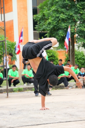 MUANG, MAHASARAKHAM - JUNE 24 : Unidentified boy is performing B-Boy dance in mini - half marathon contest and festival on June 24, 2012 at city plaza, Mahasarakham, Thailand.のeditorial素材
