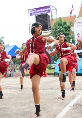 MUANG, MAHASARAKHAM - JUNE 24 : Unidentified girls are performing Boxing dance in mini - half marathon contest and festival on June 24, 2012 at city plaza, Mahasarakham, Thailand.のeditorial素材