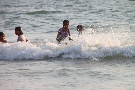 CHANTA BURI, THAILAND - FEBRUARY 1 : Unidentified tourists are enjoy playing on the beach on February 1, 2012 at Chao Lhao Beach, Chanta Buri, Thailand.のeditorial素材