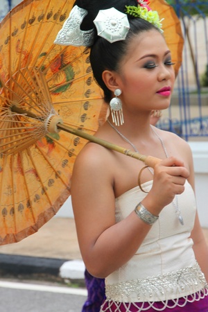 MUANG, MAHASARAKHAM - AUGUST 25 : Unidentified school parader is marching in sport day, promotes good activities and protests in bad social issues on August 25, 2012 at city plaza, Muang, Mahasarakham, Thailand.のeditorial素材