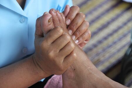 Reflexology massage, spa foot treatment,Thailandの写真素材