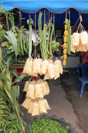 MUANG, MAHASARAKHAM - OCTOBER 5 : Unidentified villagers are decorating shop and preparing food cooking contest in healthy way of life festival on October 5, 2012 at sport ground, Kerng local administration institute, Muang, Mahasarakham, Thailand.のeditorial素材