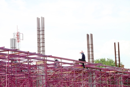 MUANG, BURIRAM - SEPTEMBER 23 : Unidentified men are working in the building site on September 23,...