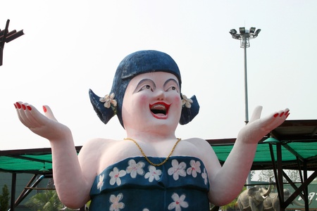 Happy woman statue on October 14, 2012 at Pak Chong Floating Market, Korat, Thailand.のeditorial素材