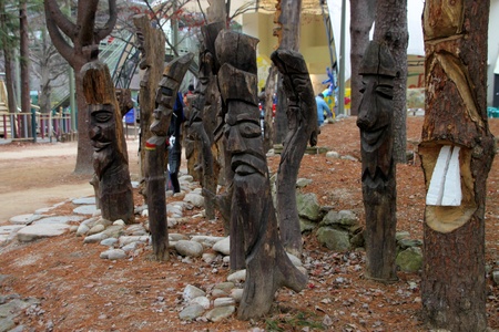 Wood carvings in front of island cultural center on November 26, 2011 at Nami island, Naminara Republic, Korea.のeditorial素材