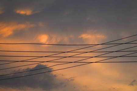 electricity wire and sky background at sunsetの写真素材