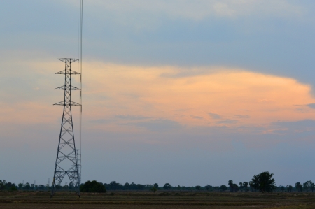 electricity tower and sky background at sunsetの写真素材