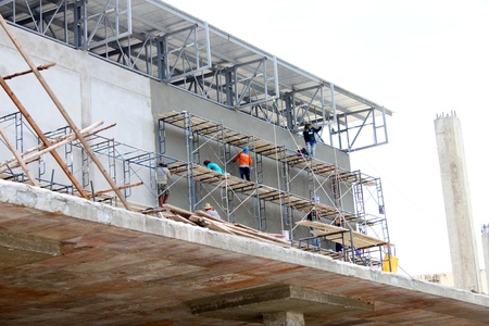 BURIRAM, THAILAND - JUNE 16 : Unidentified workers are working on Taweekit Plaza construction...