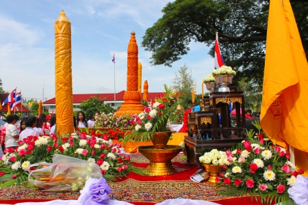 MAHASARAKHAM, THAILAND - JULY 19 : Unidentified people are participating in Buddhist Lent festival parade at city hall plaza on July 19, 2013 in Mahasarakham, Thailand.のeditorial素材
