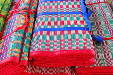 handmade woven dried sedge mat for sell in marketの写真素材