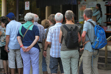 SIEM REAP, CAMBODIA - NOVEMBER 23   Tourists are waiting for tickets to visit classical construction...