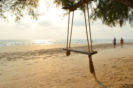 THA MAI, CHANTABURI - FEBRUARY 26   Happy man and woman are walking on the sand at Chao Lao Beach on February 26, 2014 in Tha Mai, Chantaburi, Thailand のeditorial素材
