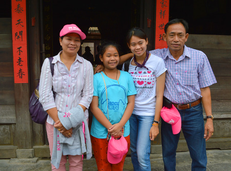 HOI AN, VIETNAM - MARCH 15   Family tourists visit and shopping at walking street of the Unesco world heritage old town on March 15, 2014 in Quang Nam, Hoi An, Vietnam のeditorial素材