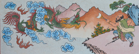 PAYAKKAPHUMPHISAI, MAHASARAKHAM - APRIL 12   Chinese style painting is shown at the wall of city shrine on April 12, 2014 in Payakkaphumphisai, Mahasarakham, Thailand のeditorial素材