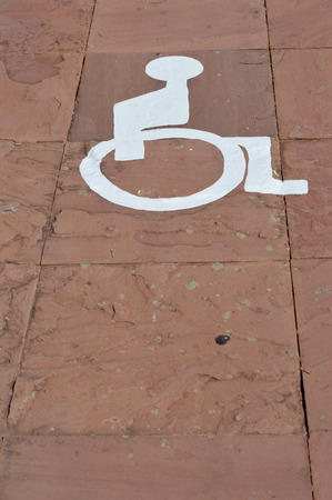 disorder patient wheelchair sign painting on brick floorの写真素材