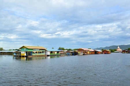 KANCHANABURI, THAILAND - SEPTEMBER 5 : Restaurant rafts are floated at the river Kwai on September 5, 2014 in Kanchanaburi, Thailand.のeditorial素材