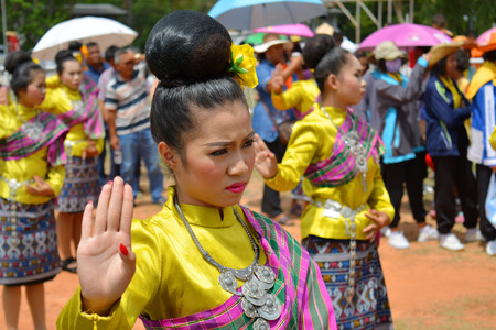 PAYAKKAPHUMPHISAI  MAY 23 : Dancers perform Thai dance in rocket festival celebration for plentiful rains during growing seasonon May 23 2015 in Payakkaphumphisai MahasarakhamThailand.のeditorial素材