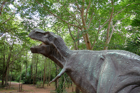 dinosaur in tropical forest garden in Kalasin of Thailandの写真素材