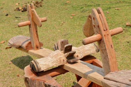 wooden horse chair for children decorated in gardenの写真素材
