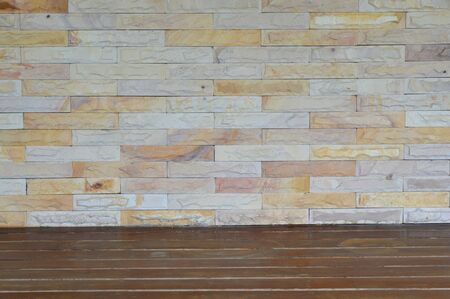 brick wall and wooden floor of exterior building and backgroundの写真素材