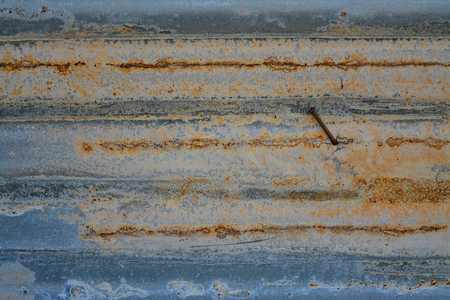 old and grunge nail and metal wall background