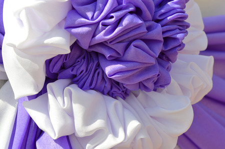 art and technique of clothes bind down and pleating in ceremony place decoration handworkの写真素材