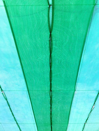 old shading net under sun lightの写真素材