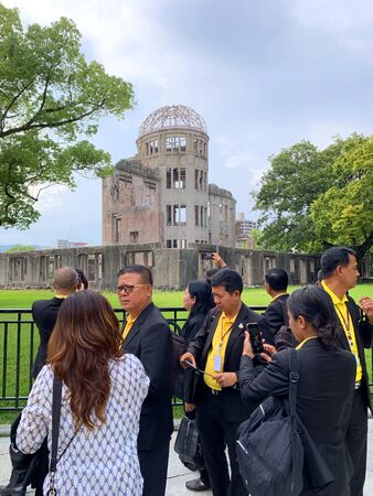 Hiroshima, Japan - August 21, 2019: Tourists visit Atomic Bomb Dome or Genbaku Dome on August 21, 2019 in Hiroshima, Japan.のeditorial素材