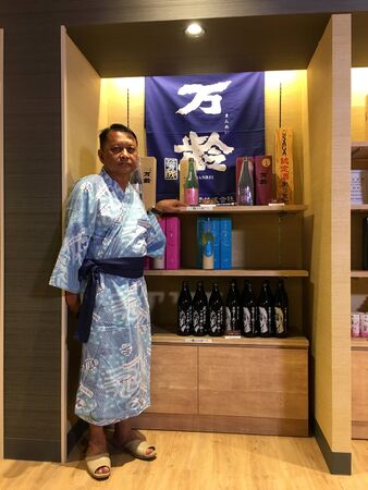 FUKUOKA, JAPAN - August 20, 2019 : Tourist is dressing Yukata Japanese clothes at Daiwa Royal Hotel on August 20, 2019 in Fukuoka, Japan.のeditorial素材