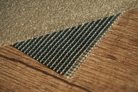 Abrasive equipment sanding sheets and sanding sponge for rubbing the wall or wood. Close-up with copy spaceの写真素材