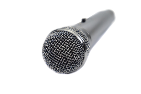 Silver vocal microphone perspective view close up isolated on a white backgroundの写真素材