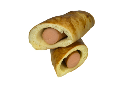 Sausage roll cut in half isolated on a white backgroundの写真素材