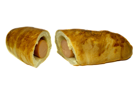 Sausage roll cut in half isolated on a white backgroundの写真素材