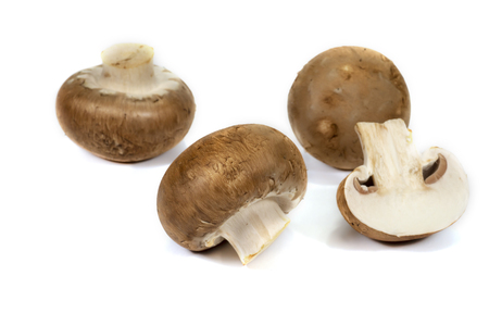 Fresh whole brown (Baby Bella) mushrooms isolated on a white backgroundの写真素材
