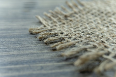 Jute fabric in close-up on grey rustic backgroundの写真素材