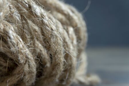 Jute twine in close-up on grey rustic backgroundの写真素材