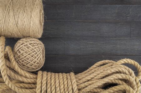 Jute twine in close-up on grey rustic background, free copy space for textの写真素材