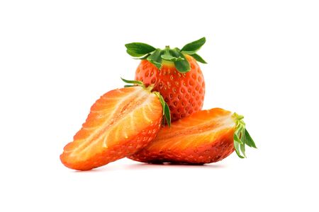 Whole strawberry fruit and half isolated on white backgroundの写真素材