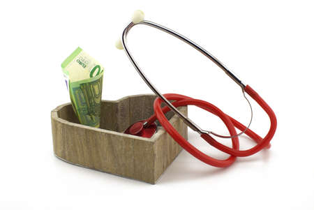Concept of healthcare and medical costs with stethoscope and euro banknotes money with copy space...
