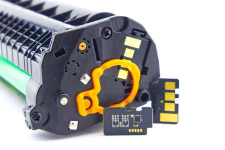 Laser printer toner cartridge and reset chip isolated on white backgroundの写真素材