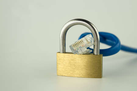 Internet security and network protection concept, padlock and network cable on grayの写真素材